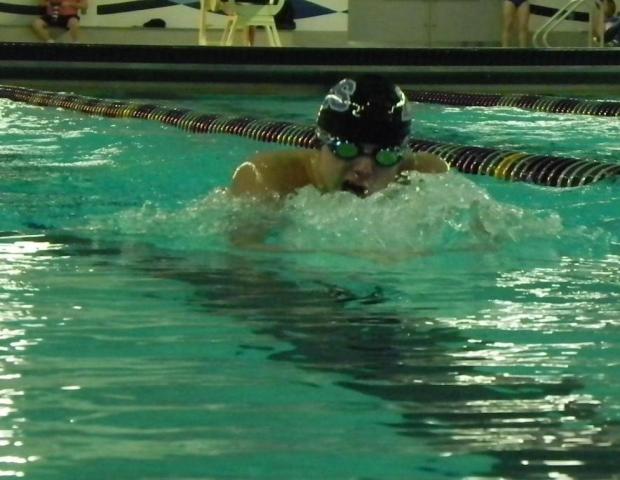 Swimming & Diving Defeat the Giants