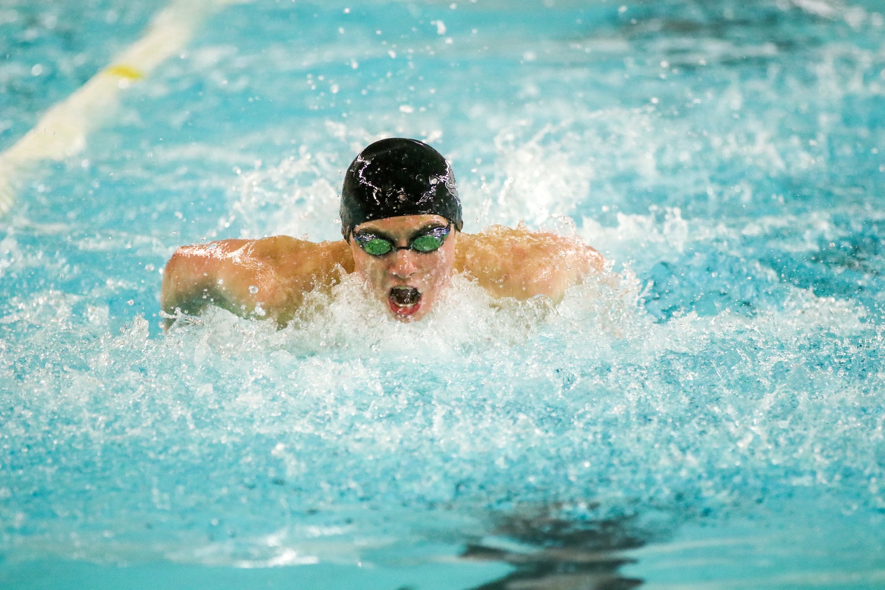 No. 14 Boys' Swimming & Diving win Bulldog Relays on final event
